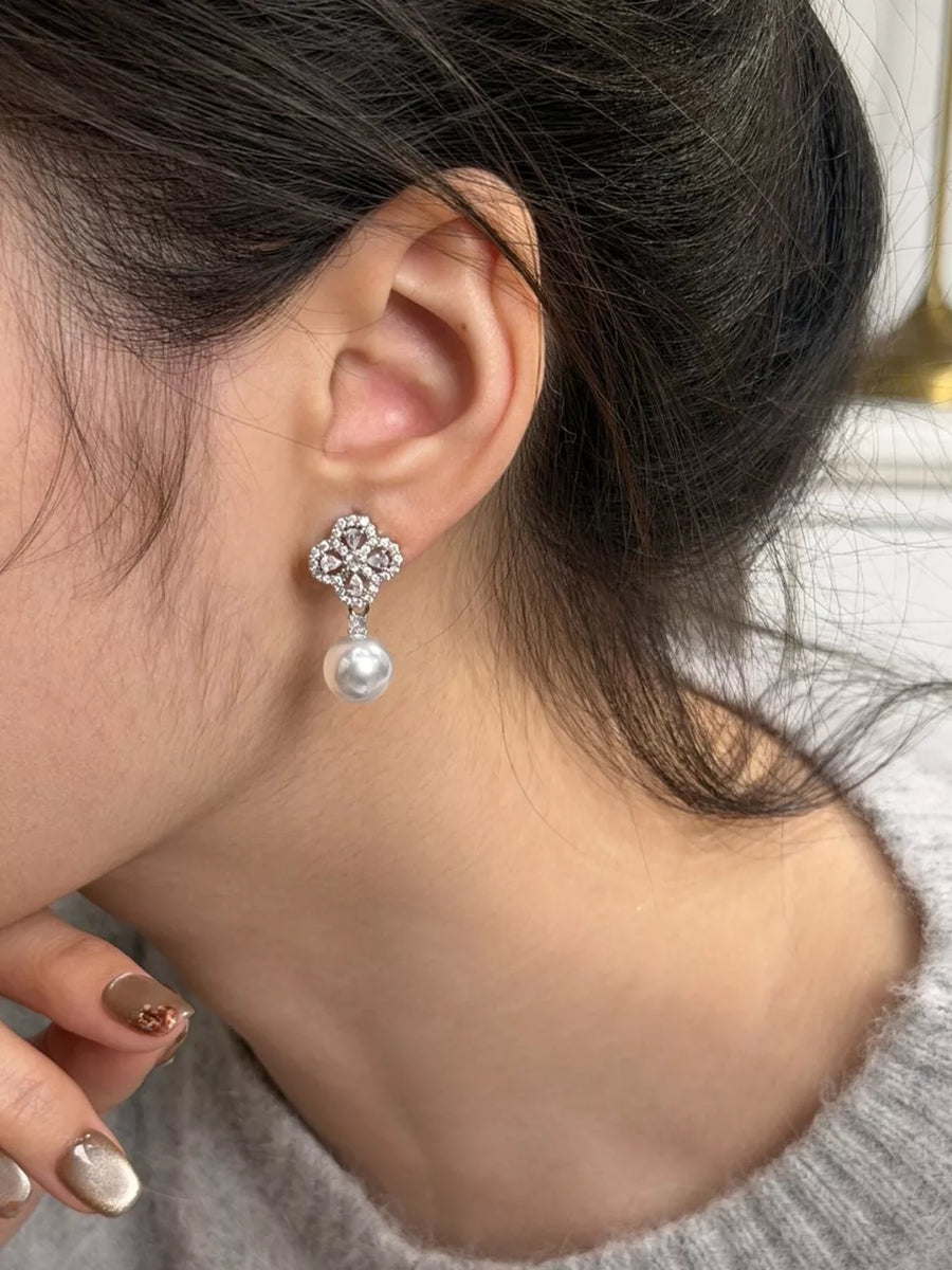 Elegant clover zircon and pearl drop earrings with a single pearl dangle.