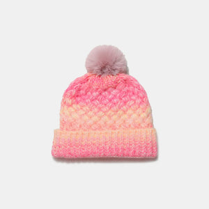 Textured ombre knit beanie in pink and yellow with a pom pom.