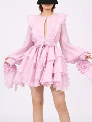 Pink tiered ruffle mini dress with button-down front and tie waist.