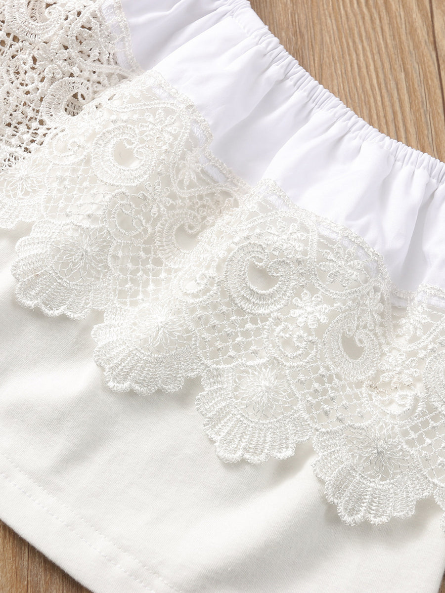 White off-shoulder cotton top with intricate lace trim detail.