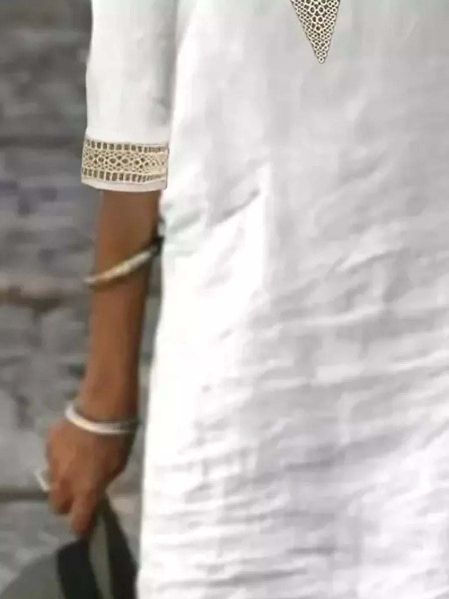 100% polyester Care instructions: Machine wash cold midi dress in White with relaxed silhouette