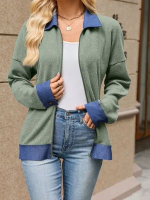 Black zip-up sweater with contrast collar and long sleeve
