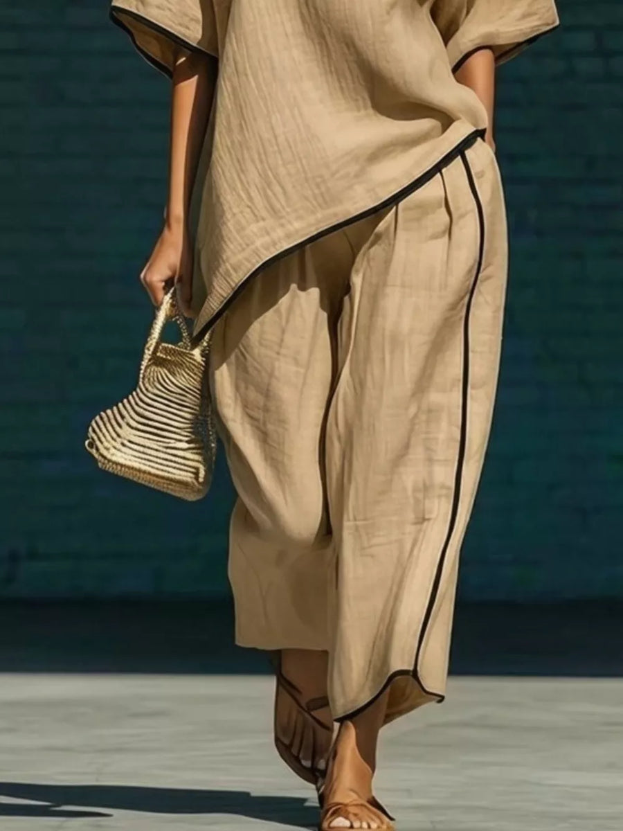 Khaki two-piece set with half sleeves and contrast trim details.