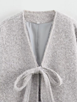 Silver gray textured knit tie-front cardigan with a V-neck and cozy fit.