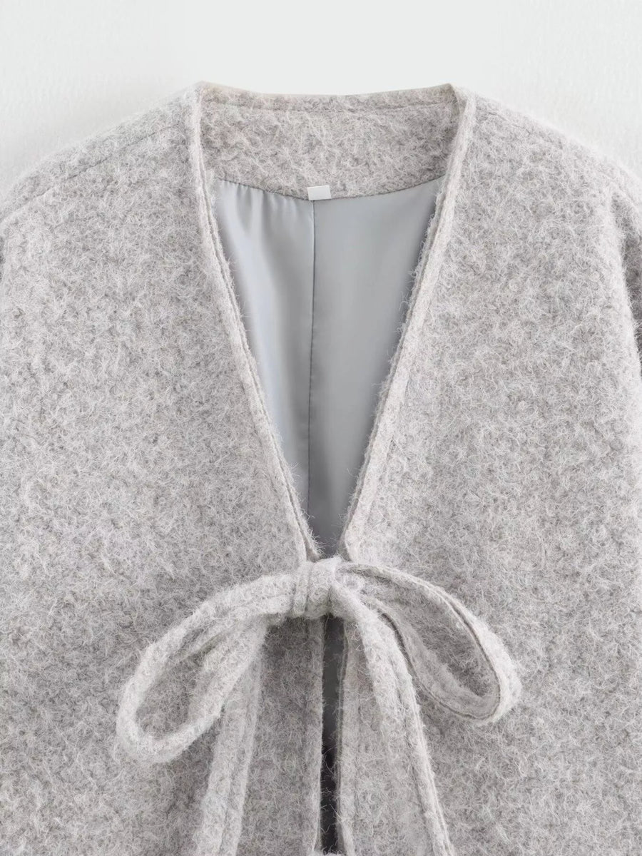 Silver gray textured knit tie-front cardigan with a V-neck and cozy fit.