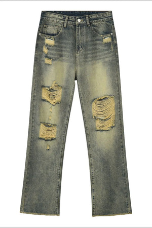 Distressed baggy denim jeans in medium wash with shredded knees and a casual fit.