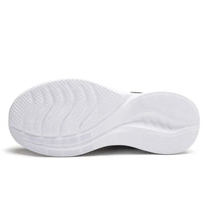 Black textured knit performance runners sole with wavy grip pattern.