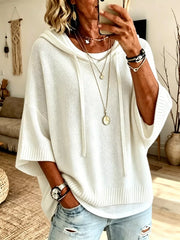 pullover sweater in ivory featuring hooded and oversized fit