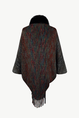 Textured knit cape with faux fur collar and fringe hem, featuring a multicolor stripe pattern.