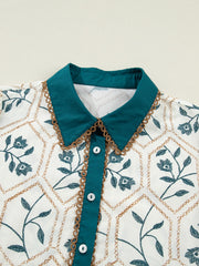 Floral print cotton mini dress with a teal polo collar and button front.