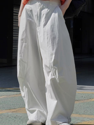 wide-leg pants in cream featuring washed and wide-leg fit