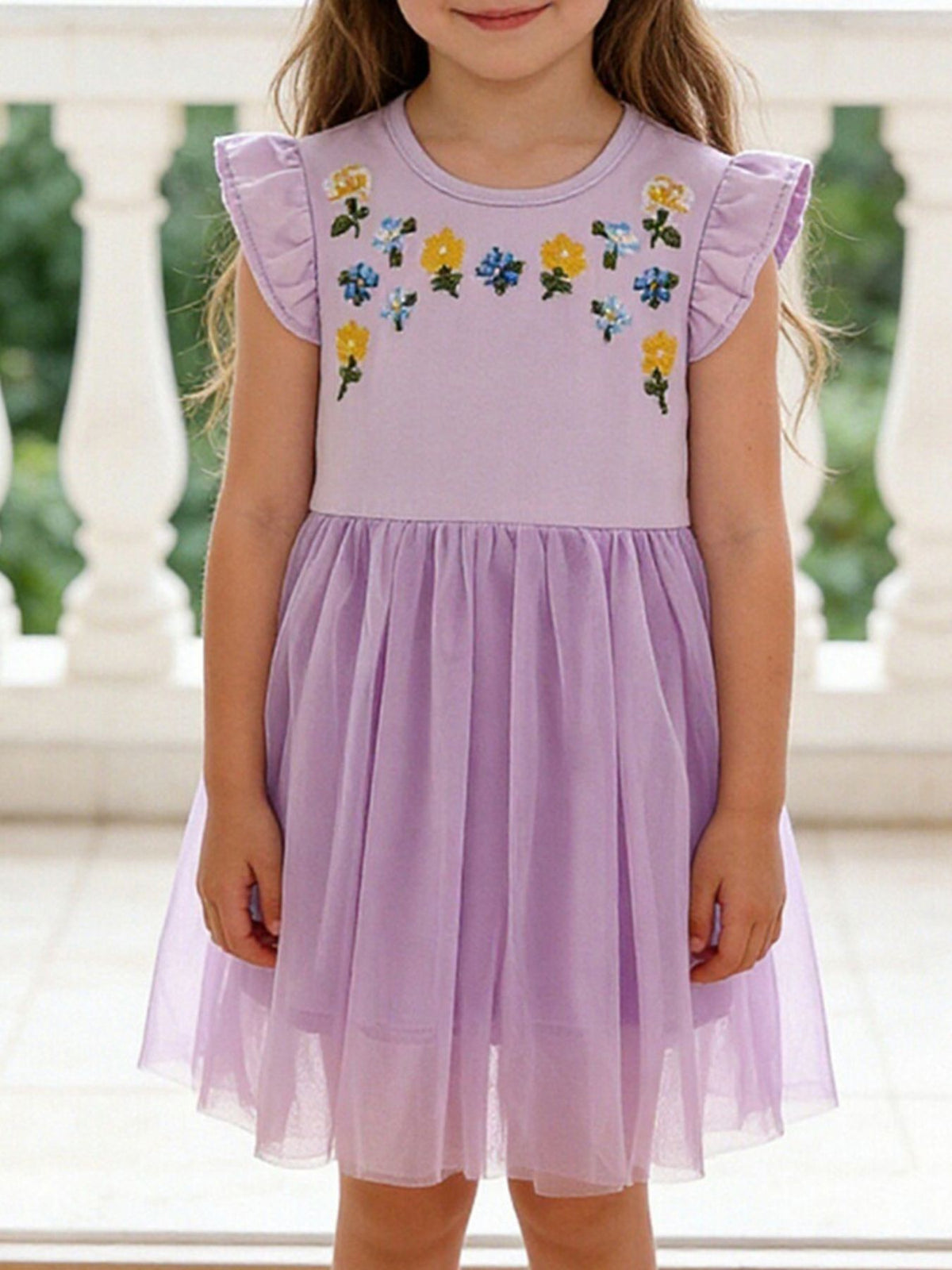 Lavender tulle toddler dress with floral embroidery and flutter sleeves.