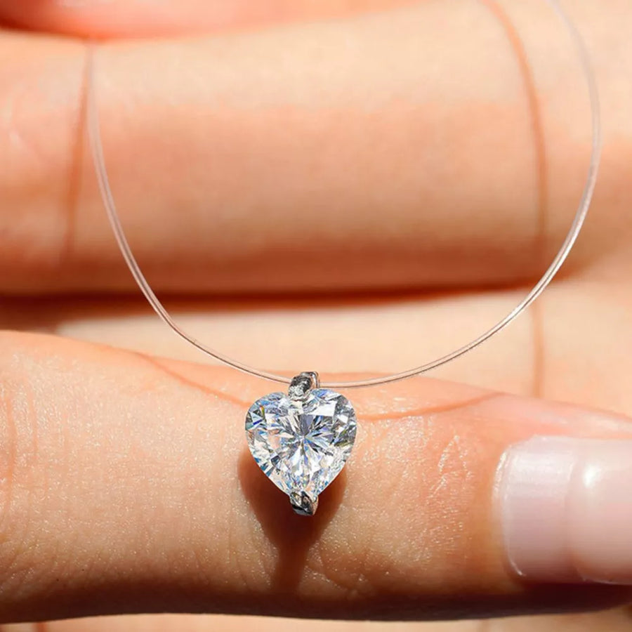 925 sterling silver,Moissanite Carat weight: 1ct Care instructions: Avoid wearin necklace in silver with fitted silhouette