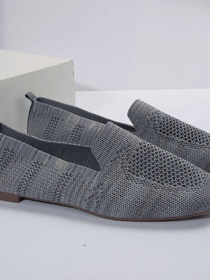 Knit ballet flats in gray with a textured pattern and slip-on style.