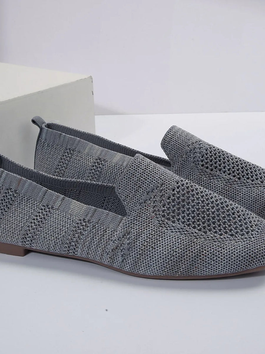 Knit ballet flats in gray with a textured pattern and slip-on style.