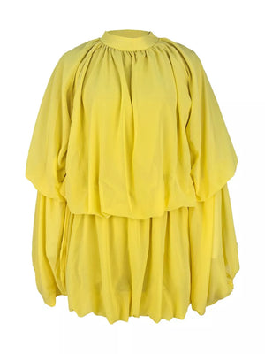 Yellow tiered dress with voluminous sleeves and gathered neckline