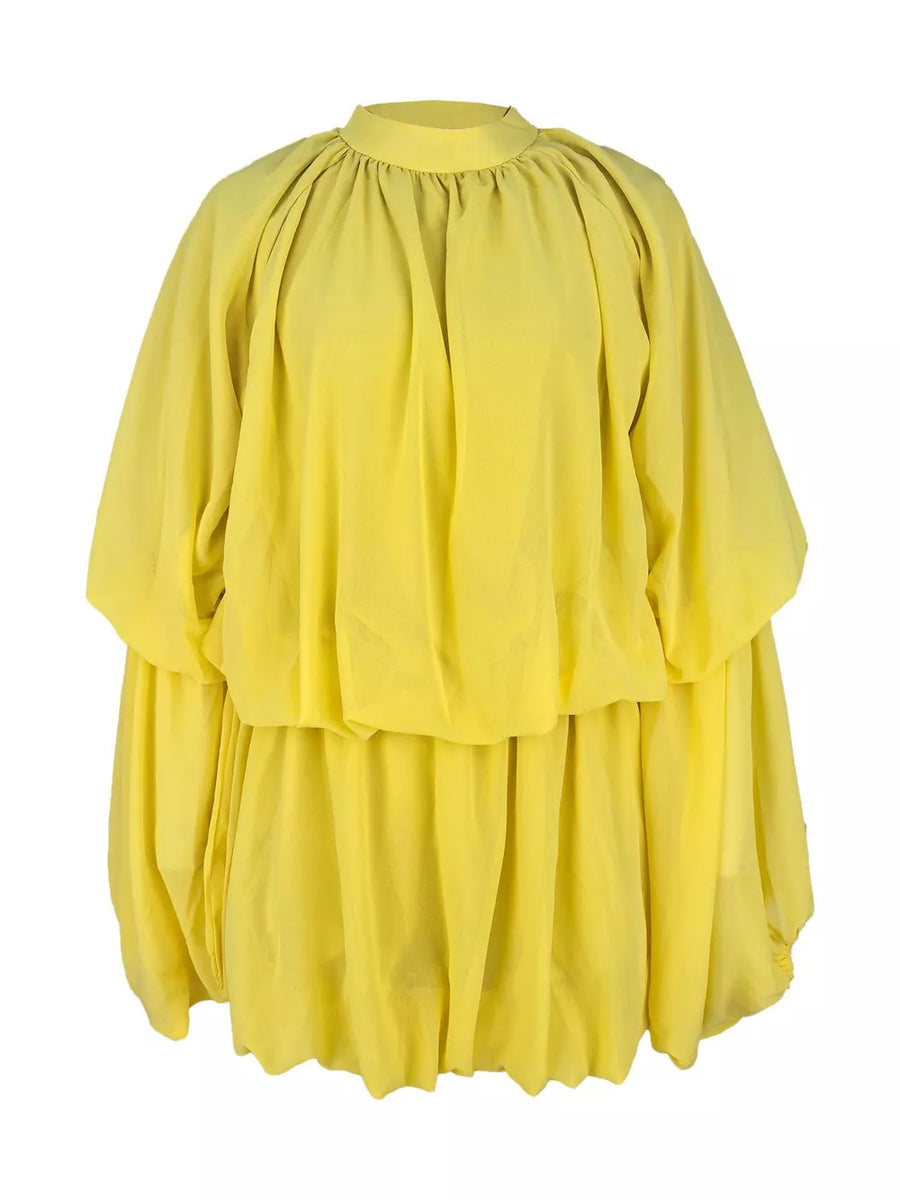 Yellow tiered dress with voluminous sleeves and gathered neckline