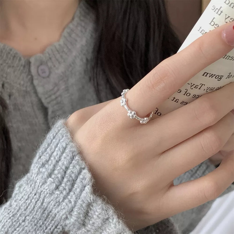 ring featuring floral in silver with 925 sterling silver Care instructions: Avoid wearing during exercise, as sweat w texture