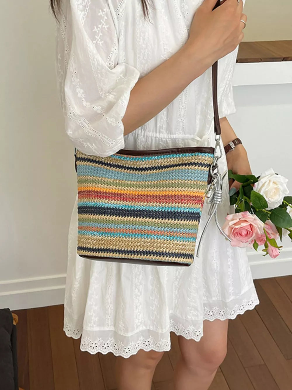 crossbody bag in navy blue featuring adjustable strap and boxy fit