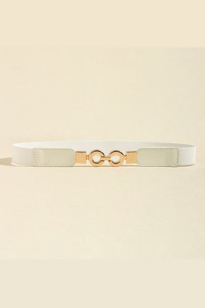 White elastic belt with gold interlocking circle buckle and faux leather ends