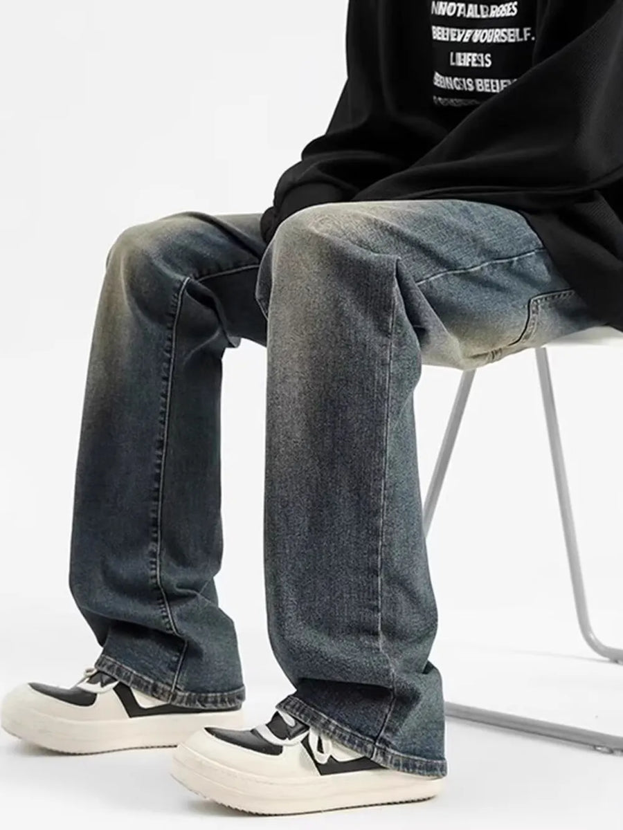 Relaxed fit men's jeans in heritage wash denim with whiskering details.