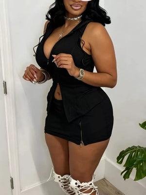 Black hooded zippered sleeveless top and mini skirt set with zipper details.
