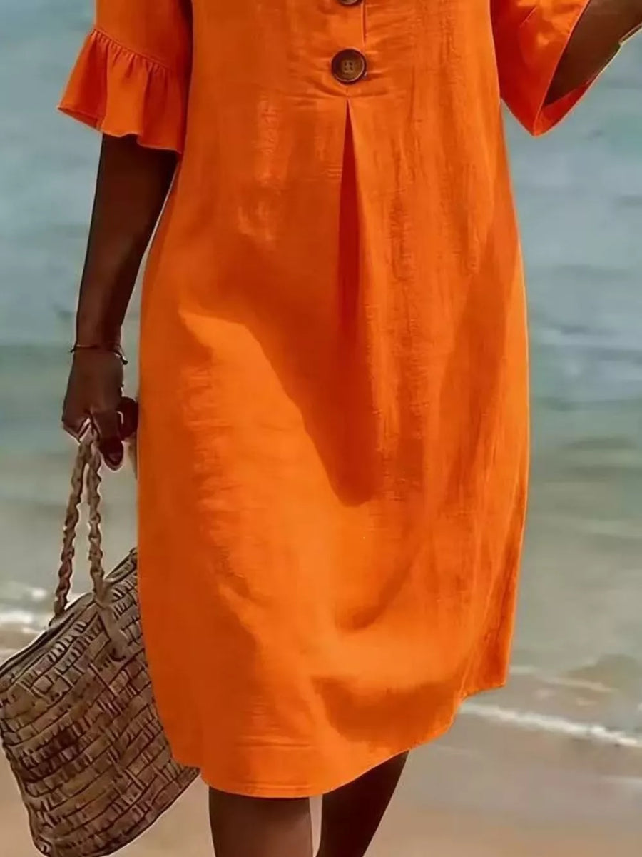 Orange ruffled sleeve button detail dress with a relaxed fit, perfect for beach casual wear.