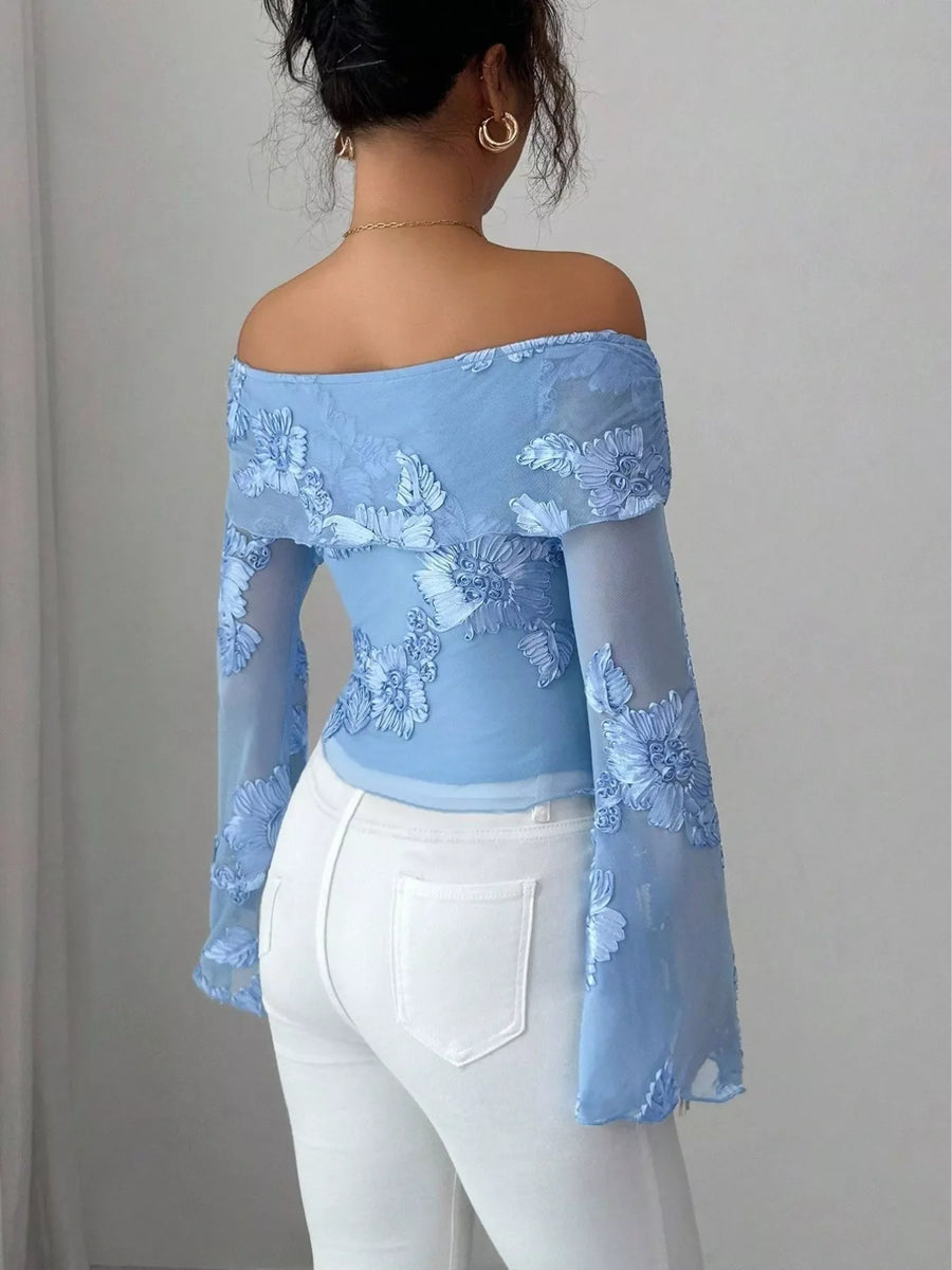 Sky blue floral off-shoulder blouse with sheer bell sleeves and embroidered flowers.