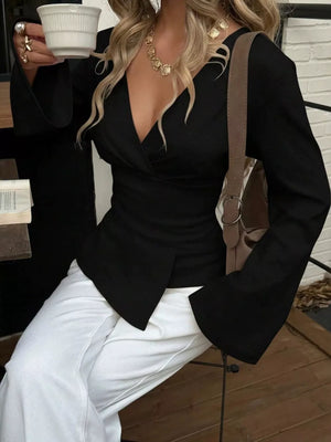 Black fitted wrap top with v-neck