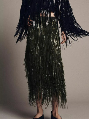 Fringe embellished two-piece set with sequined army green skirt and black fringed jacket.