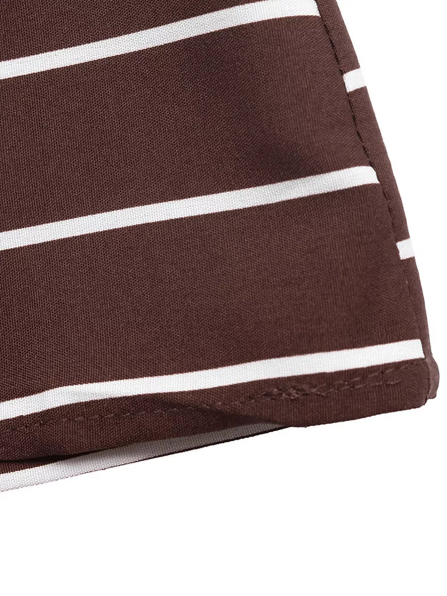 Brown and white striped maternity swim dress detail showing hem and stitching.
