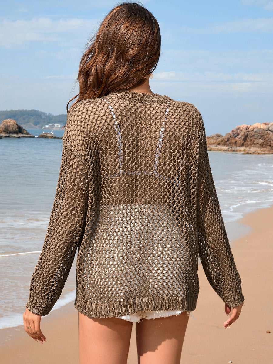 Open-knit pullover sweater in Mocha, featuring a relaxed fit and long sleeves, perfect for beach days.