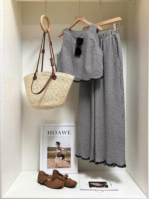 Plaid two-piece set with scalloped trim and wide-leg pants.