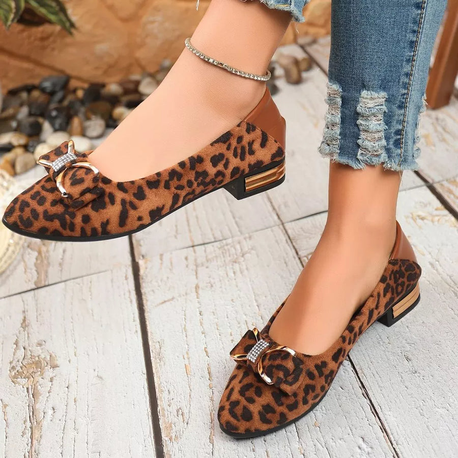 Leopard print block heels with bow detail and gold accents