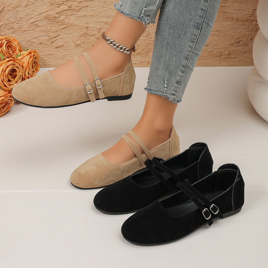 Mary Jane flats in light tan featuring round toe and flat fit
