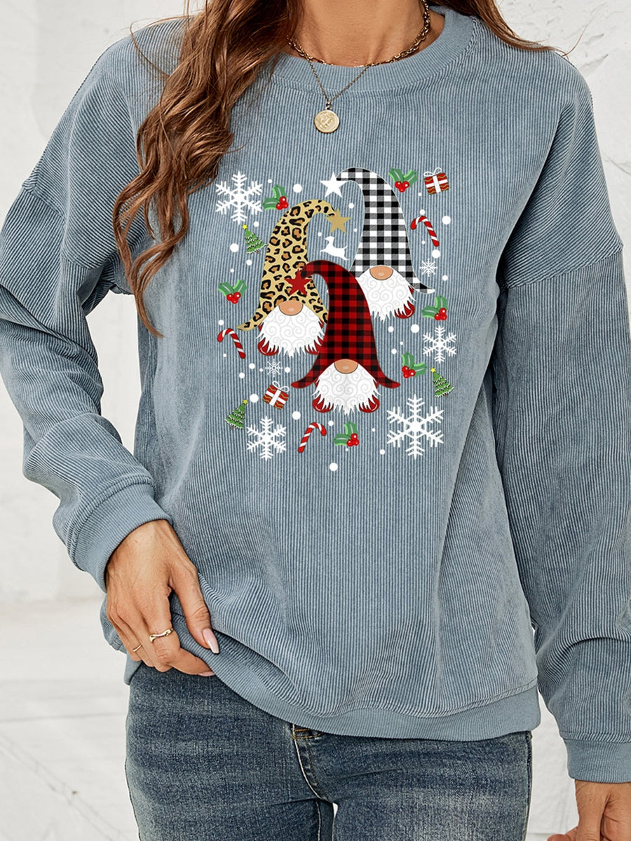 Corduroy sweatshirt in light blue with a gnome graphic featuring buffalo plaid, leopard print, and snowflakes.