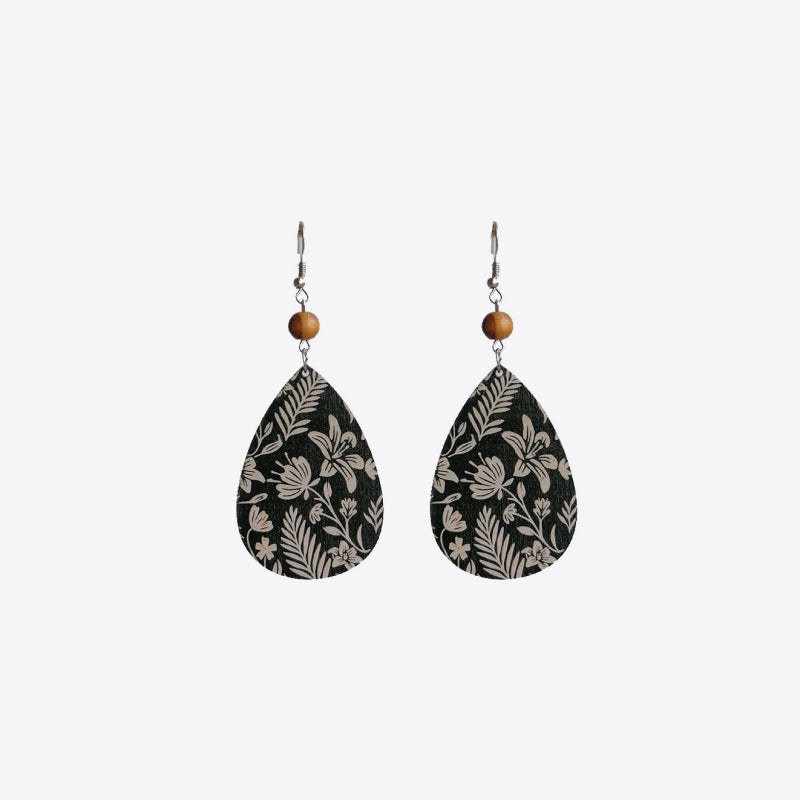 Botanical drop earrings with wood bead, black with cream floral pattern