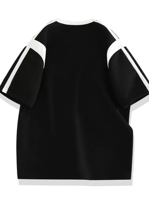 Black t-shirt with white stripe accents on sleeves and neckline.