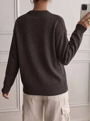 minimalist pullover sweater in Black with henley