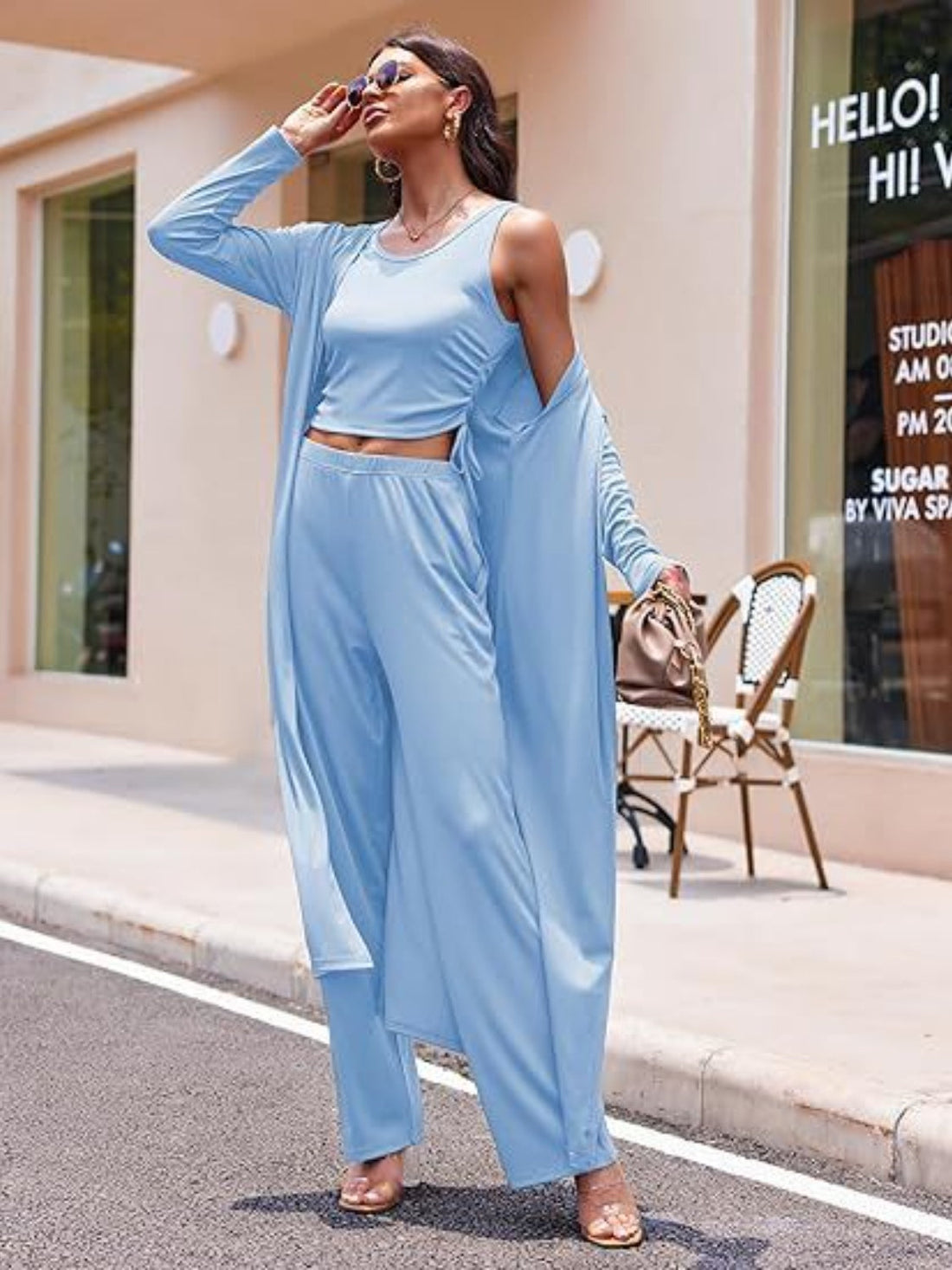 Light blue ribbed knit duster, tank top, and wide-leg pants lounge set.