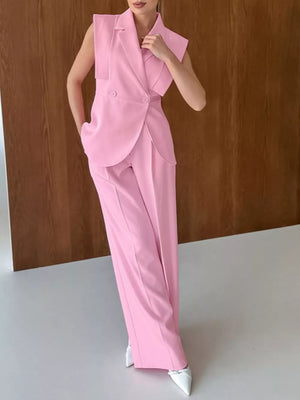 95% polyester, 5% spandex Care instructions: Machine wash cold two-piece set in light pink with fitted top, wide-leg bottom