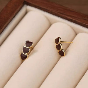earrings in gold featuring stud design and jewelry fit