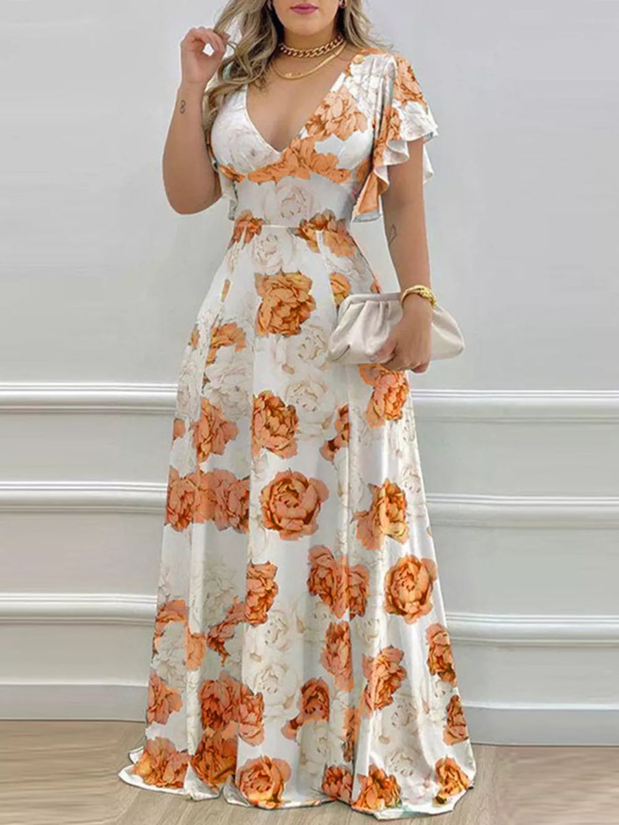 Maxi dress in pumpkin floral print with V-neck and ruffle sleeves.