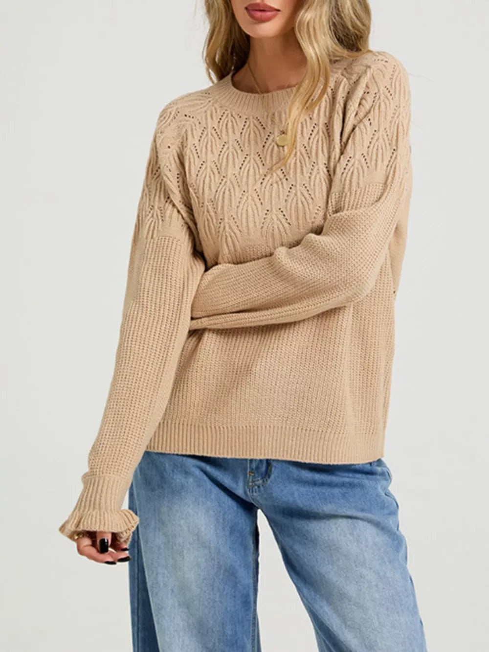 100% Acrylic Care instructions: Machine wash cold pullover sweater in Black with relaxed silhouette