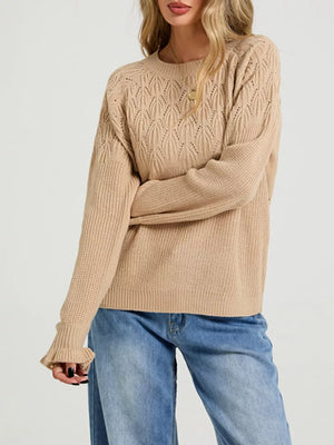 100% Acrylic Care instructions: Machine wash cold pullover sweater in Black with relaxed silhouette