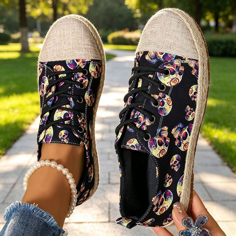 light beige sneakers featuring round-toe and skull-print