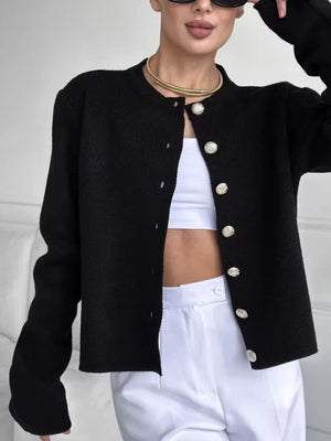 100% polyester Care instructions: Machine wash cold cardigan in ivory with relaxed silhouette
