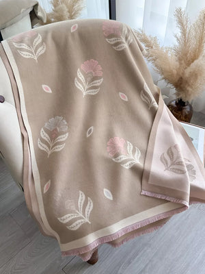 Khaki floral print fringed shawl with pink and white flowers and leaves, featuring a striped border.
