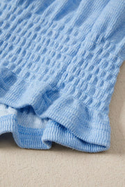Blue knit set with textured fabric and drawstring jogger pants detail
