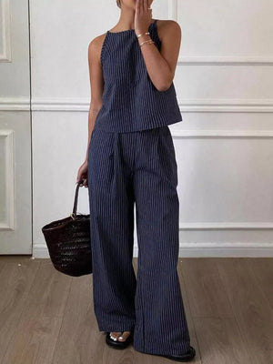 Blue striped sleeveless top and wide-leg pants set with a high neckline.